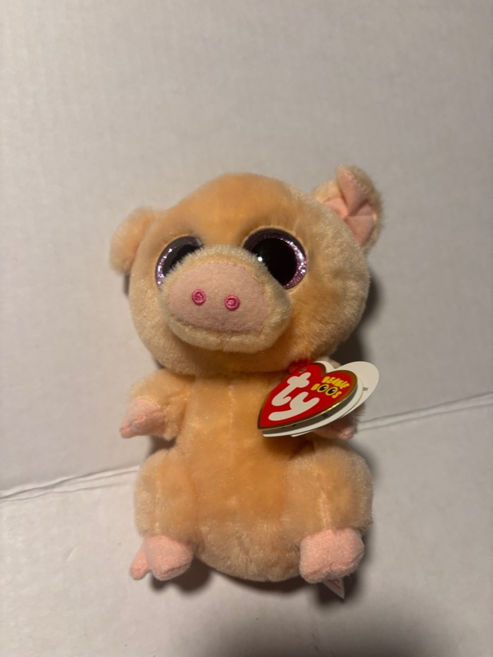 Ty Peach Pig  Piggley Beanie Boo Plush with Sparkle Purple Eyes